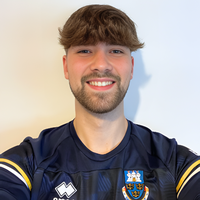 Billy Wegg smiling at camera.