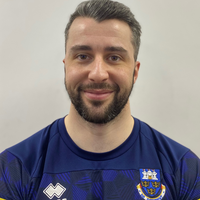 Stefan physio smiling at camera.