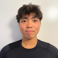 Tim Chuck smiling at camera.