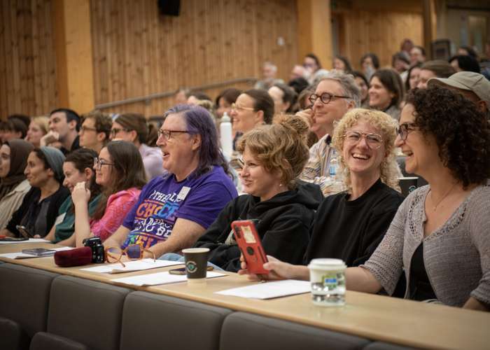 This image shows an audience of people at a BCLT translation event at UEA