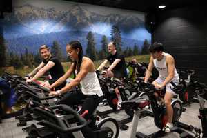 students sat on bikes using cycle studio