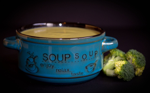 A bowl containing broccoli soup