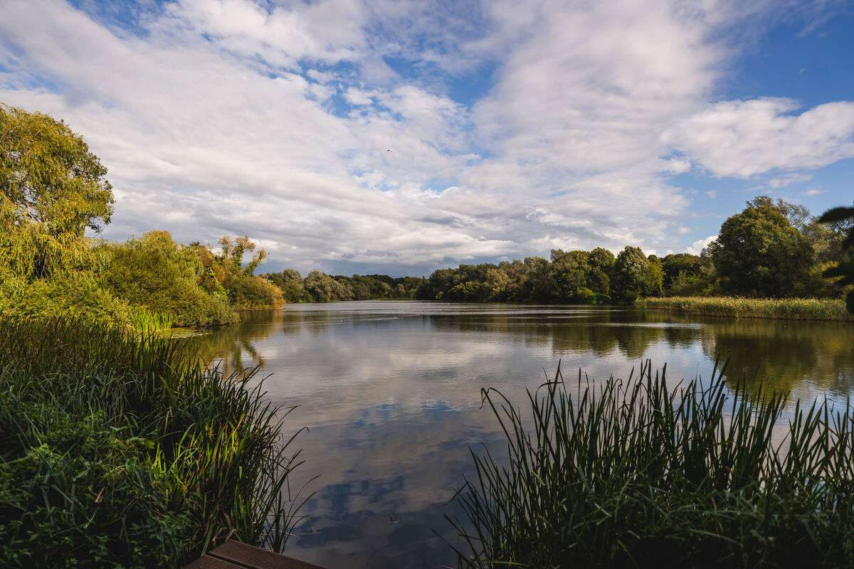 The broad on UEA campus, with a light covering of clouds wafting around