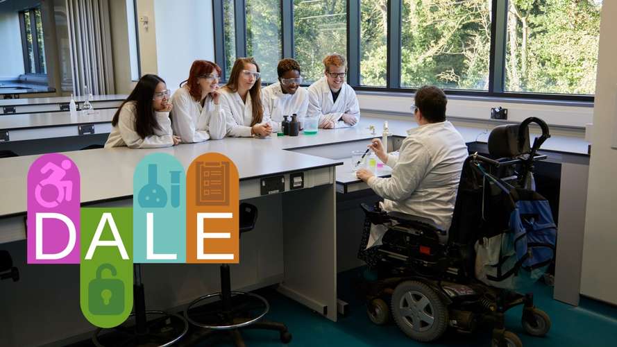 Dr Katherine Deane teaching science practical in the New Science Building with the DALE Logo which is the words DALE with disability symbols