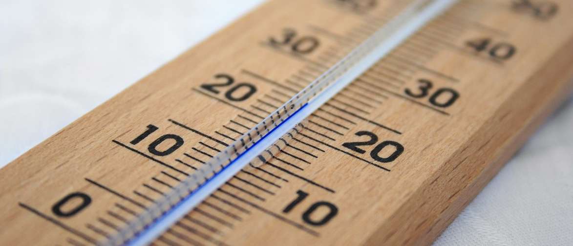Close up of a wooden thermometer