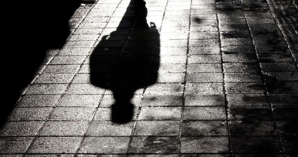 Shadow in dark street