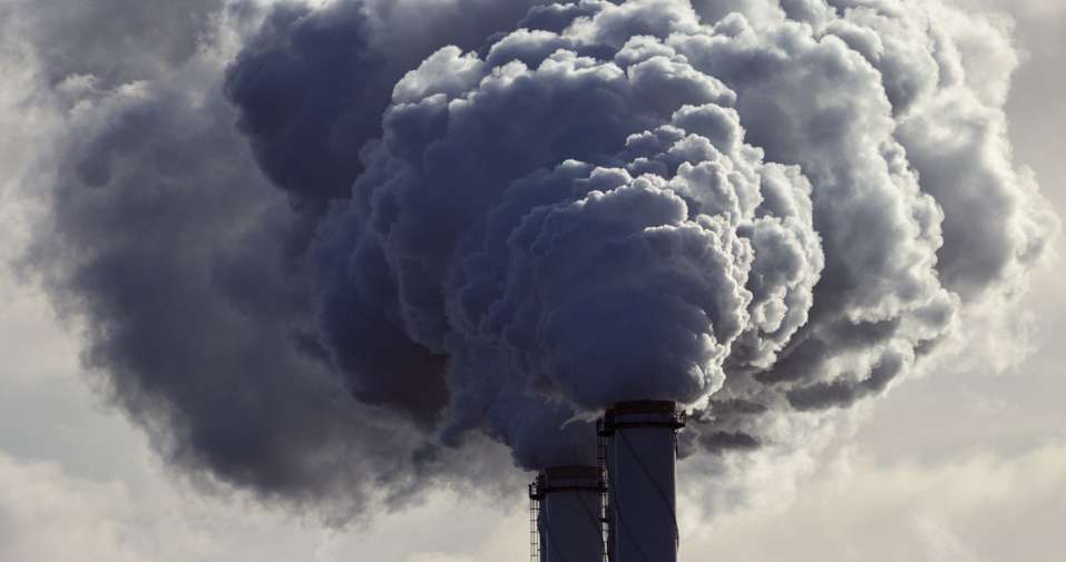 Chimney billowing out smoke
