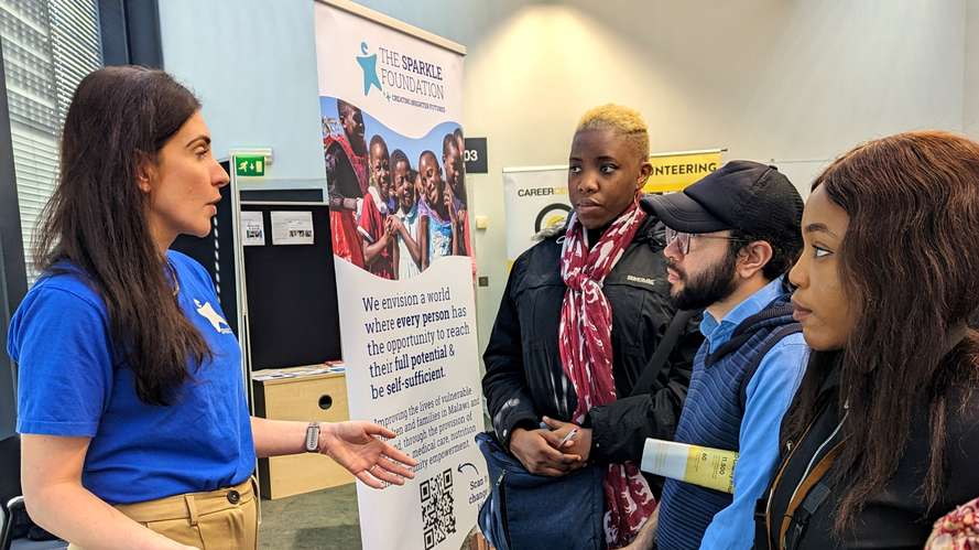 People attending a stand at Development Employability Week
