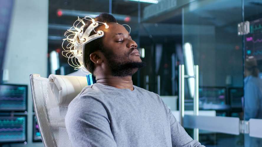 man wearing brainwave scanning headset