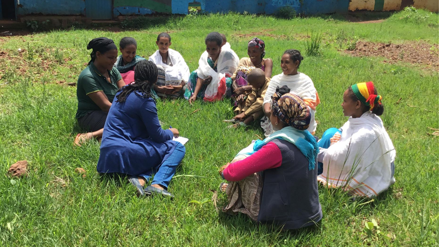 African women sitting in a circle
