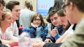 students socialising and thinking