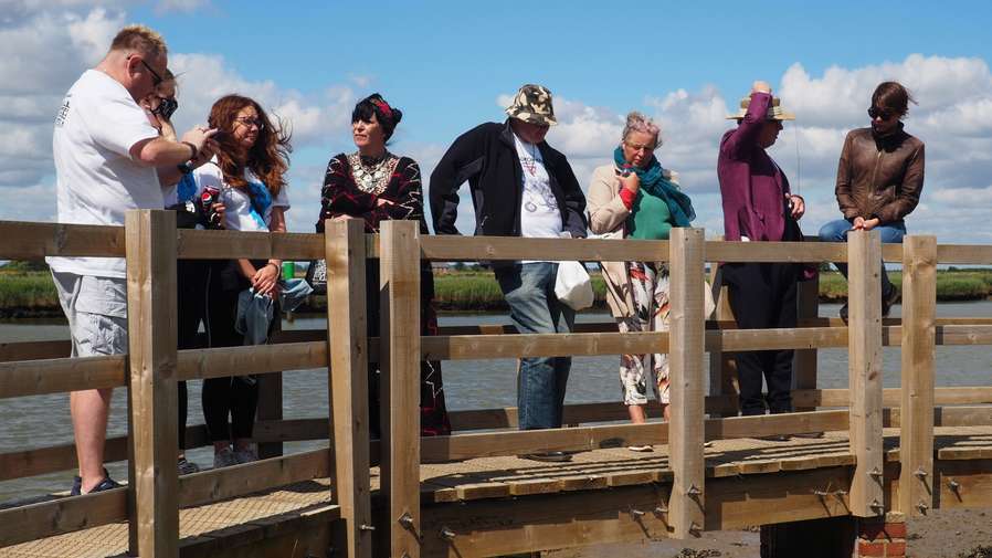 People standing on a bridge