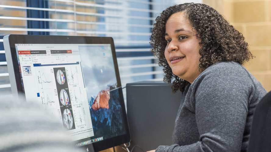 A UEA Psychology student using campus facilities