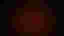 Loading volcano erupting at night...