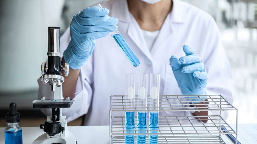 Test tubes being put in rack