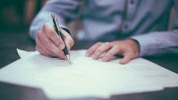 SWK_CRCF-hand and pen-scott-graham-unsplash-ICON.jpg