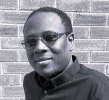 Sola Adeyemi profile headshot black and white