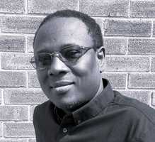 Sola Adeyemi profile headshot black and white