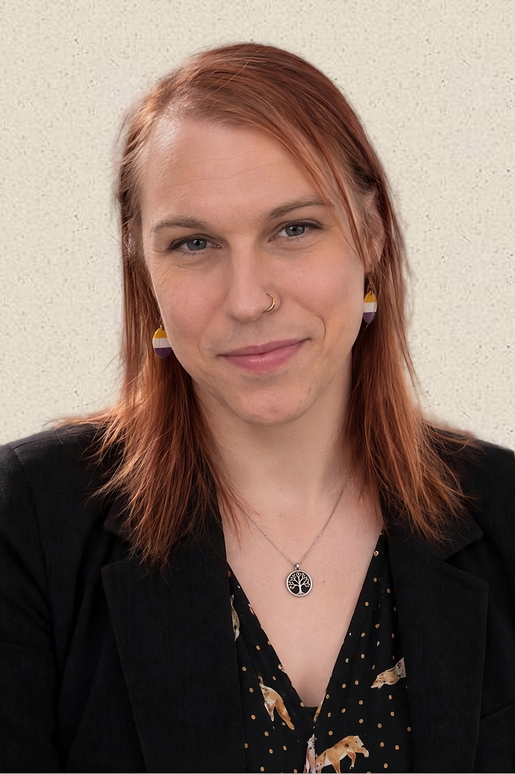 A portrait photo of someone smiling at the camera.