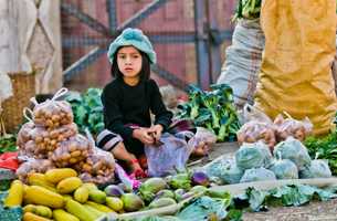 GRTA-Child-Malnutrition-child-on-food-stall