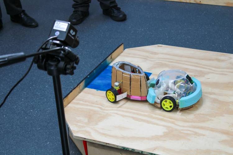 Two ScrapBots clash in the sumo arena.