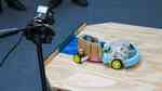 Two ScrapBots clash in the sumo arena.