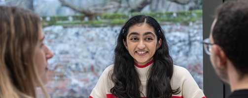 Students sitting at a table.