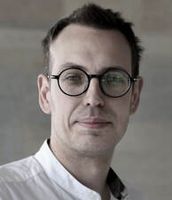 A headshot of Apostolos Davillas