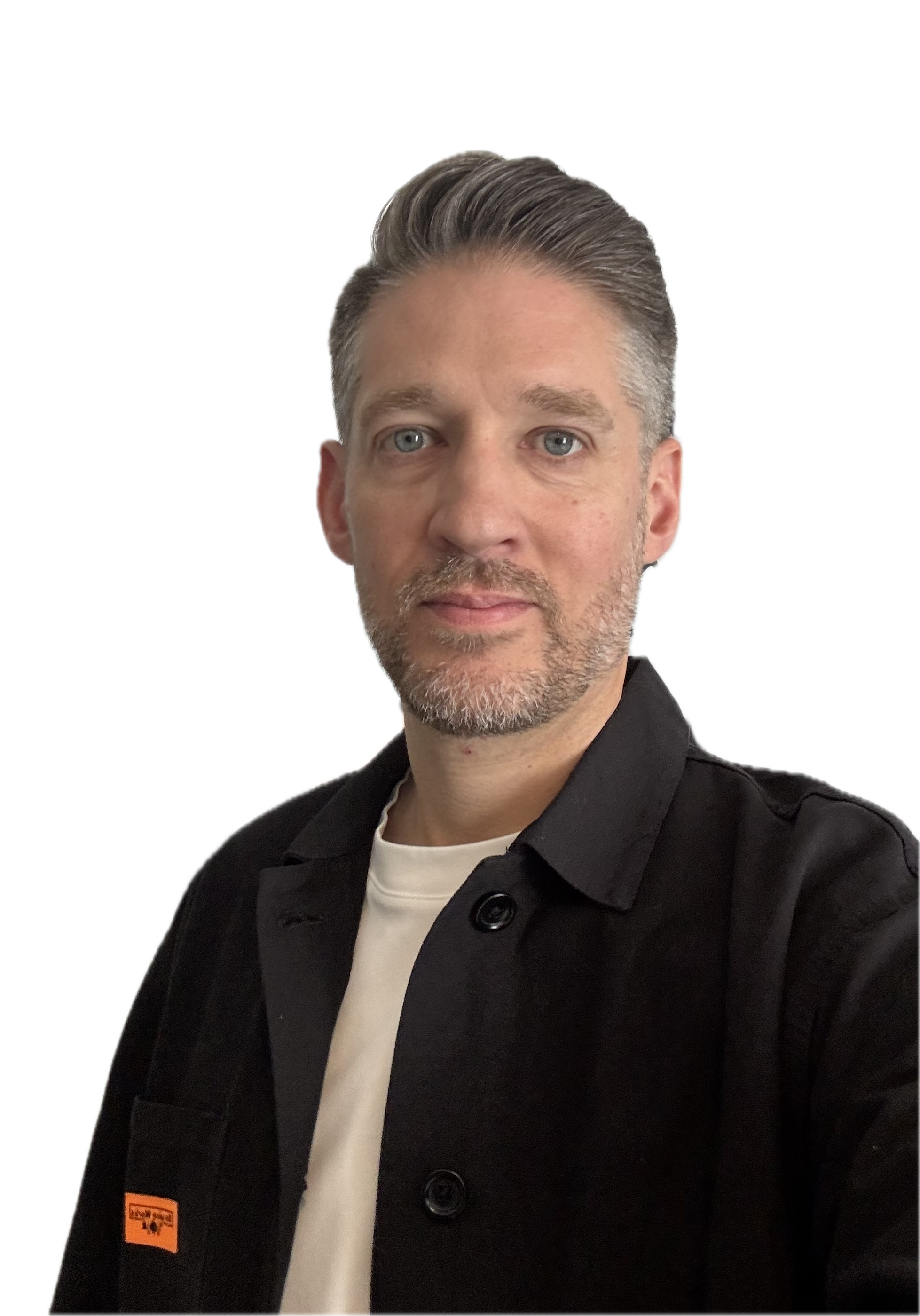 A portrait photo of someone looking at the camera.