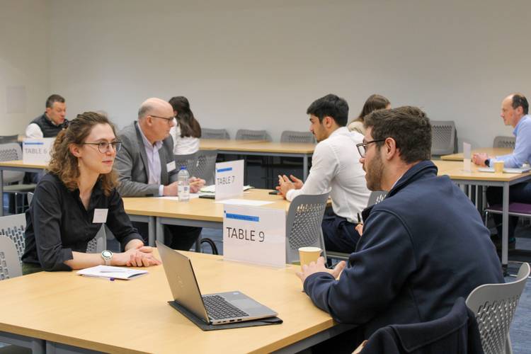 An engineering student being interviewed by a visiting professional at Select 2024.