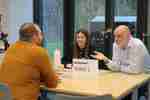 Two professionals interviewing an engineering student at Select 2024.