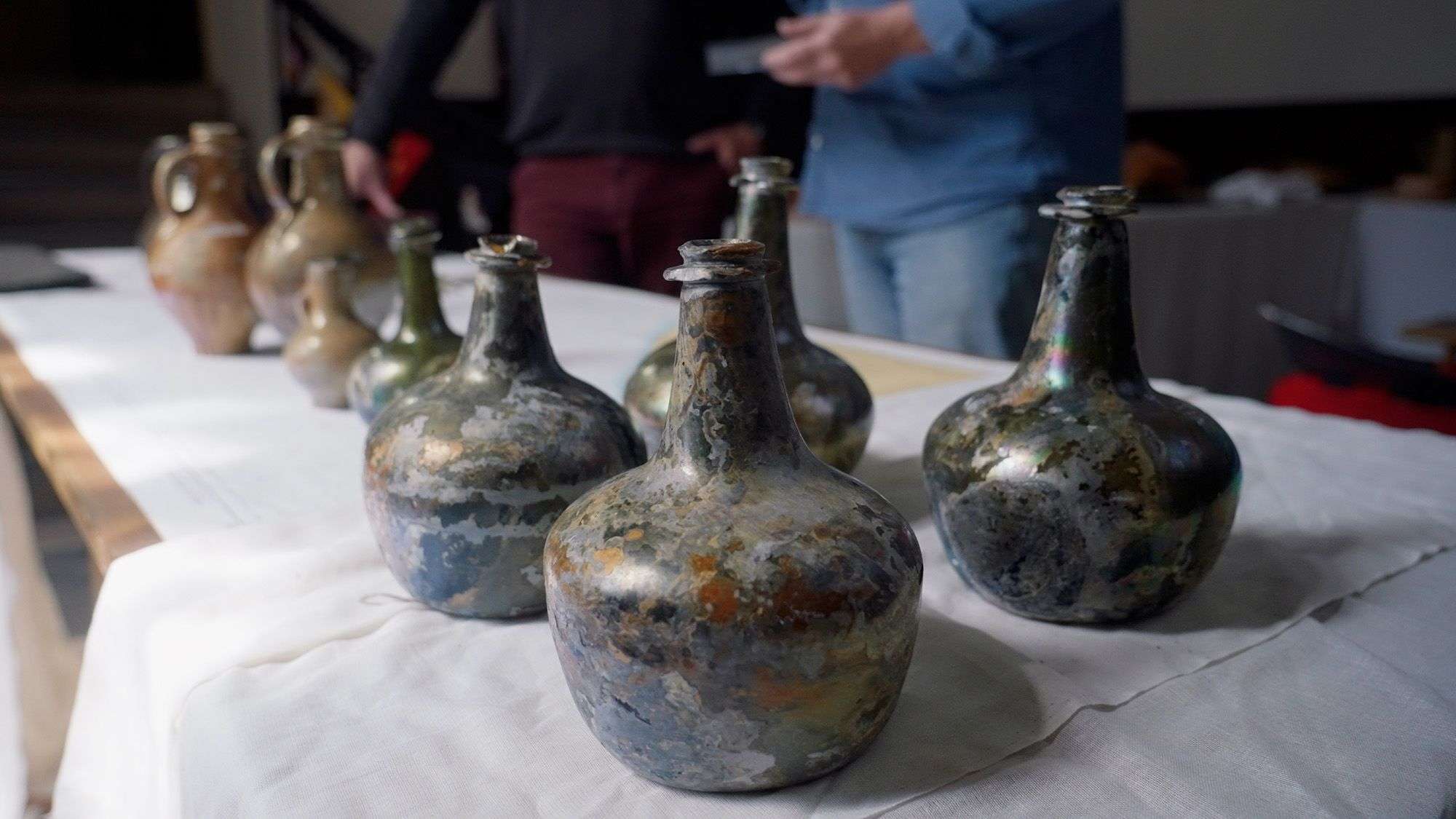 Old wine bottles with wide base and narrow spout