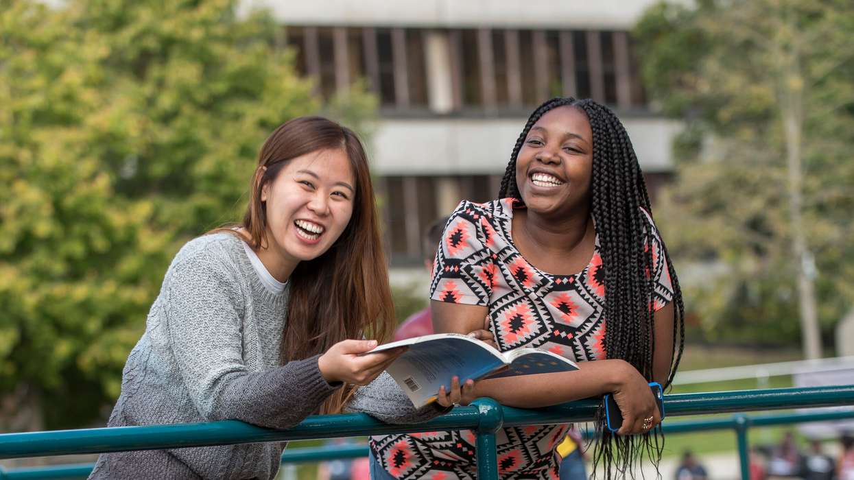 Students laughing on campus
