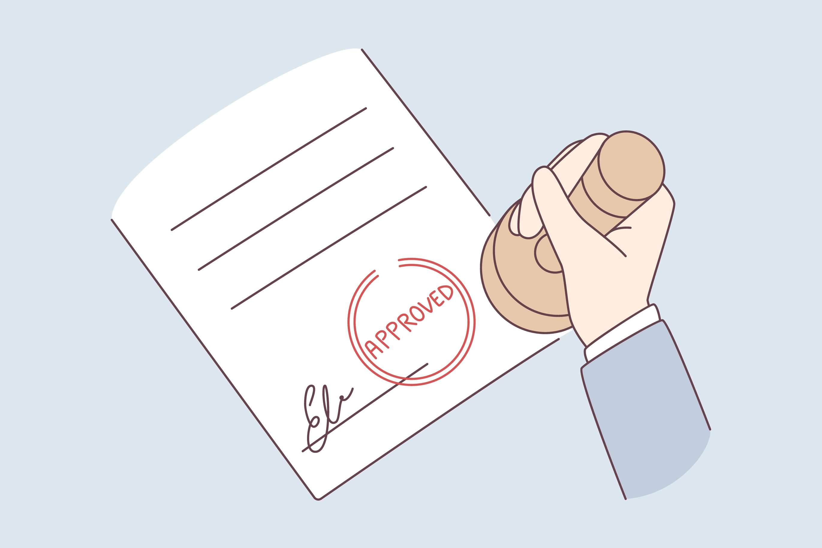 person stamping the word approved on a piece of paper