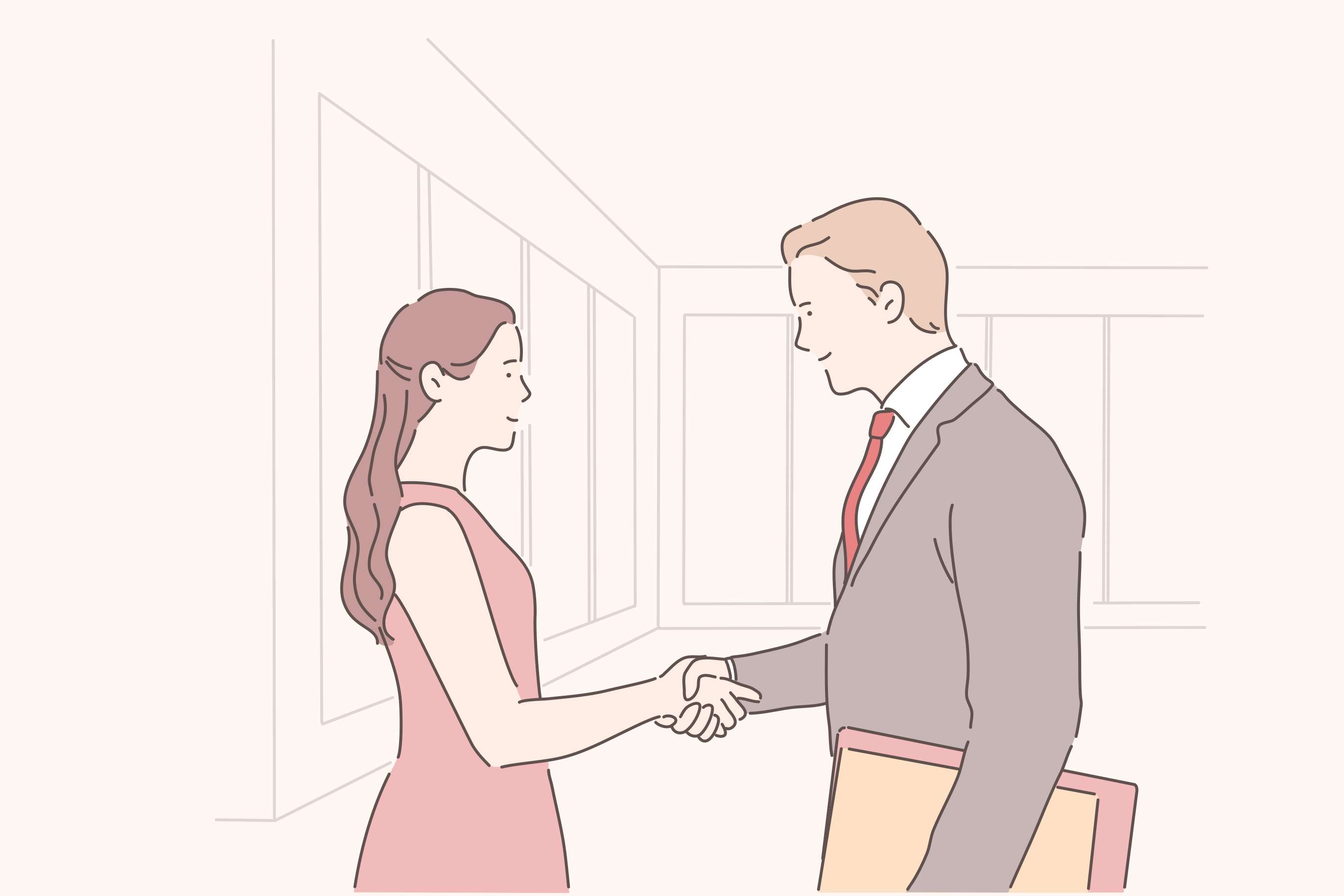Man in suit holding documents and shaking hand of woman