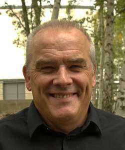 2024 headshot of David Huggins