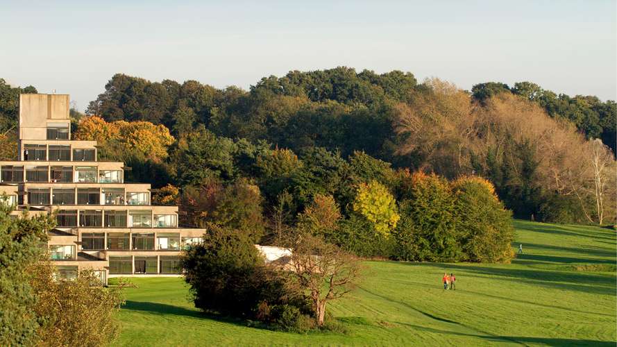 Campus views of ziggurats on autumnal day