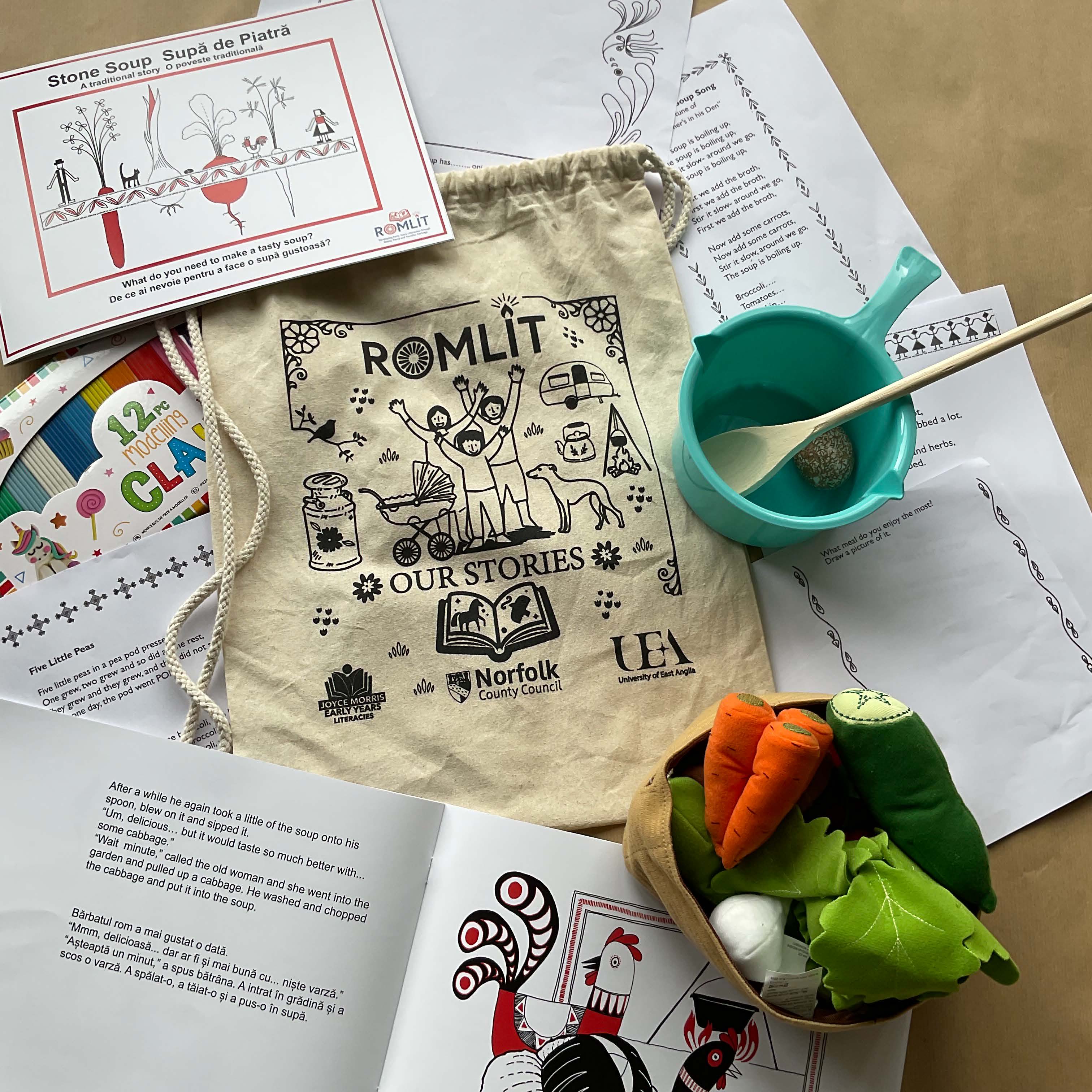 Image of resources created for ROMLIT - books, bags and props for the books