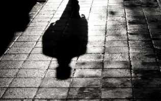Shadow in dark street
