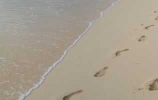 stepping-towards-better-health-footsteps-on-sand_small.jpg