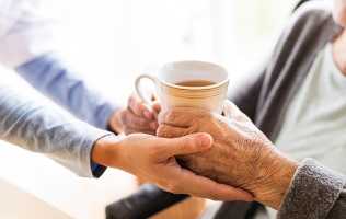 carer-handing-over-cup-of-tea_small