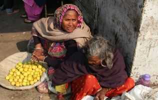 debunking-microfinance-women-in-street_small