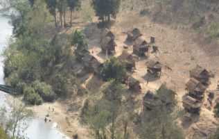 protected-areas-and-poverty-houses-near-river_small