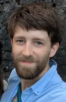 Portrait photo of Dr Connor Robbins