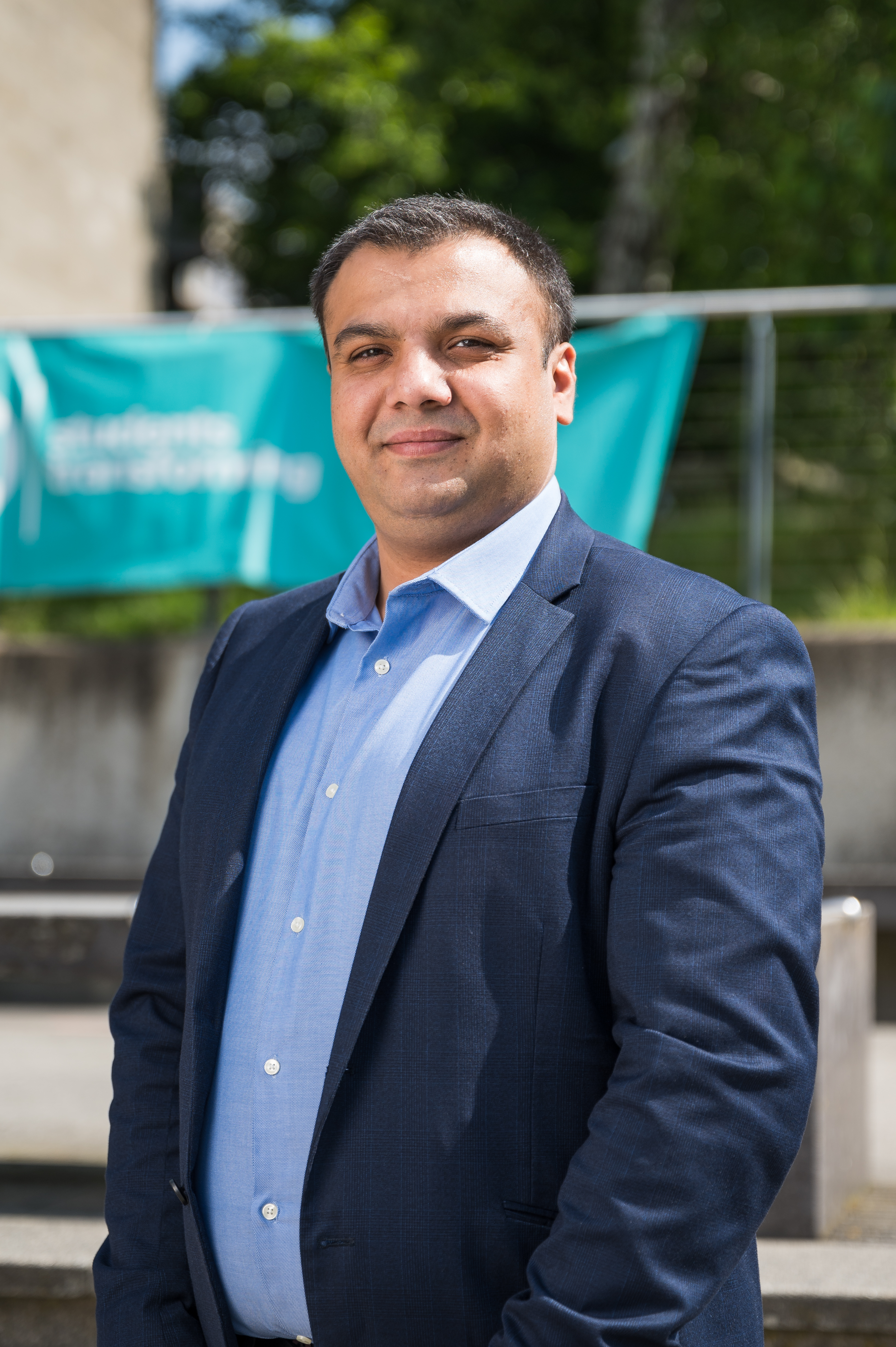 Staff member standing at UEA