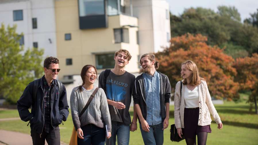 Students outside Ensuite Accommodation Nelson Court on Campus