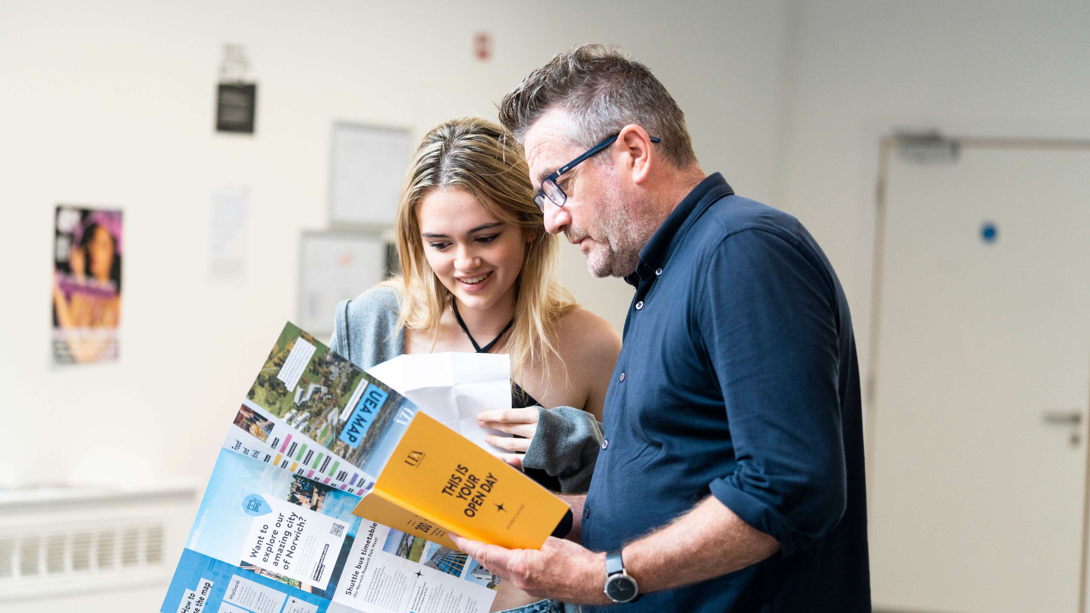 A student and parent at a UEA open day