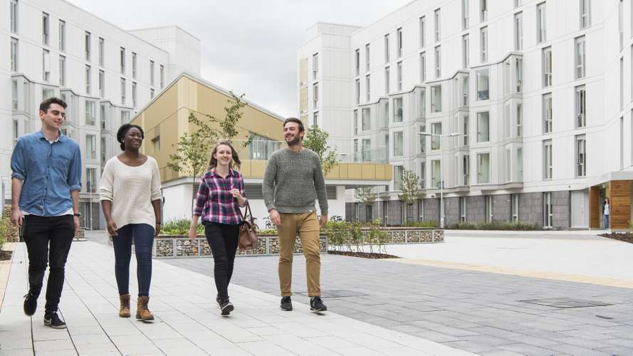 People walking outside UEA accommodation