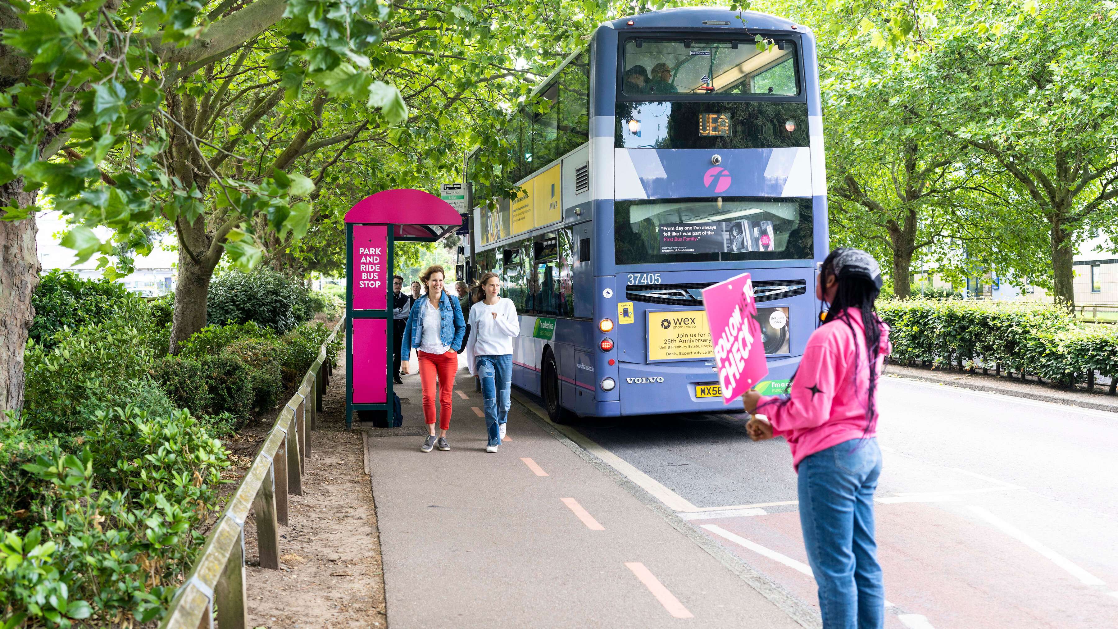Visitors arrive to campus by bus on an Open Day