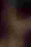 Loading young woman looking out of window...